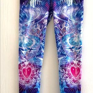 Multi colored yoga leggings runs small.